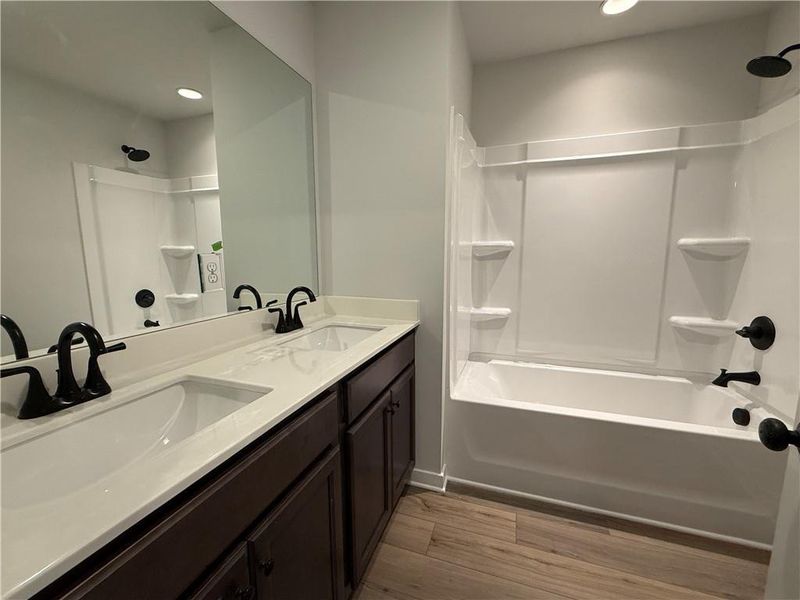 Furnished interior view inside a new home in The Towns at Auburn Station East, Auburn (Image 12).