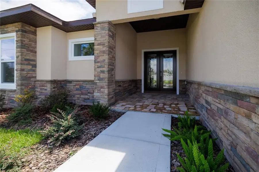 Exterior details and patio area of a home in , Palm Coast (Image 3). Exterior details and patio area of a home in , Palm Coast (Image 3).