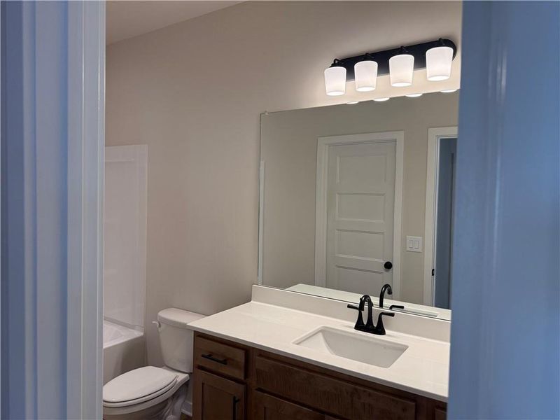 Furnished interior view inside a new home in Rosewood Lake Estates, Hoschton (Image 18).