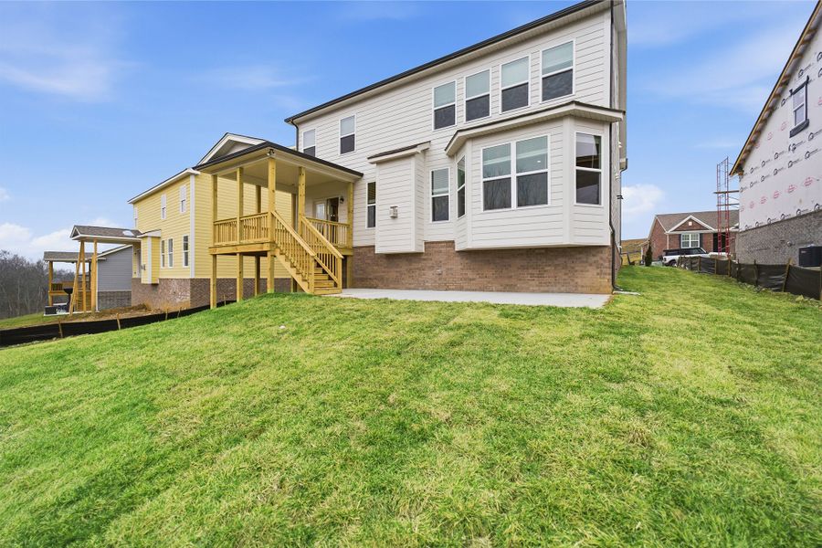 Exterior details and patio area of a home in The Retreat at Norman Farm, Hendersonville (Image 3). Exterior details and patio area of a home in The Retreat at Norman Farm, Hendersonville (Image 3).
