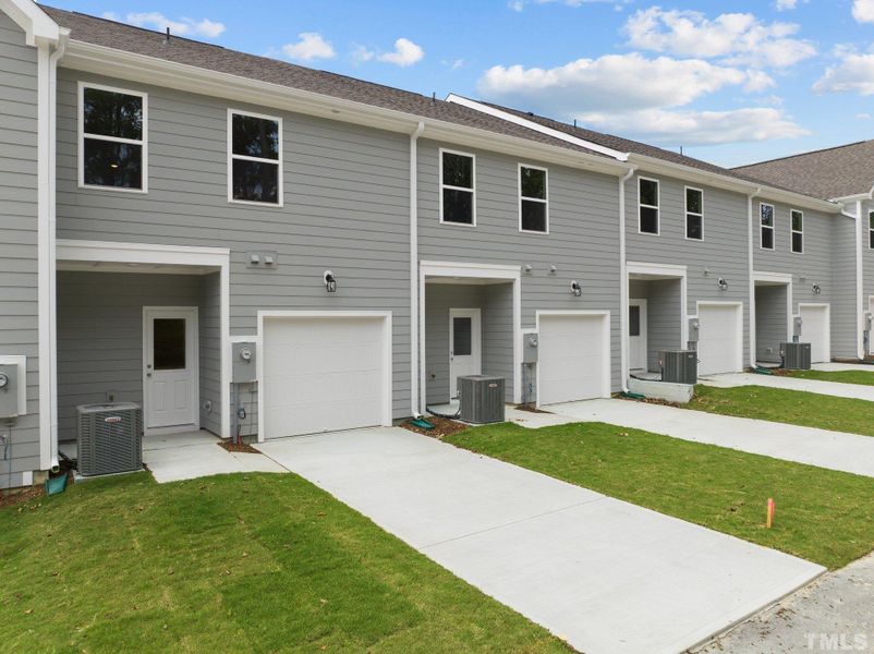 Front exterior of a home in the Tyler Gardens community, located in Wake Forest, NC (Image 22).