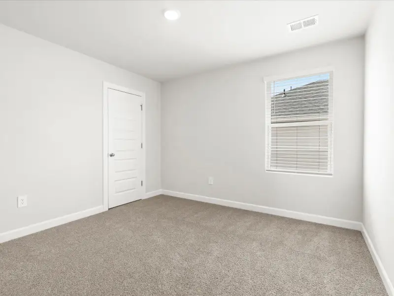 Spacious, unfurnished interior of a new home in Brayfield Manor - Heritage Collection, Wellford (Image 10).