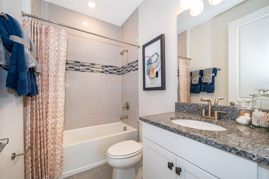 Furnished interior view inside a new home in Serenade at Ovation, Winter Garden (Image 22).