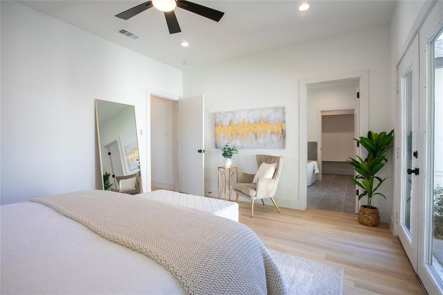 Bedroom with access to outside, ceiling fan, and light wood-type flooring