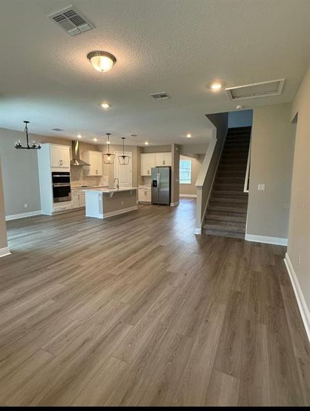 Spacious, unfurnished interior of a new home in Legends Preserve - Signature Series, Daytona Beach (Image 11).