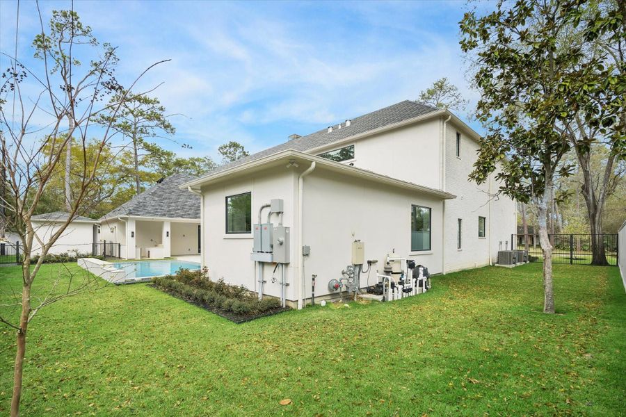 Exterior details and patio area of a home in , Houston (Image 4).