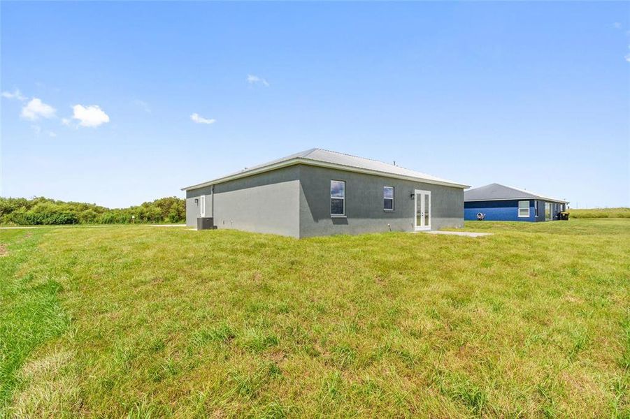 Front exterior of a new home in , Fort Meade, FL, highlighting curb appeal (Image 21).