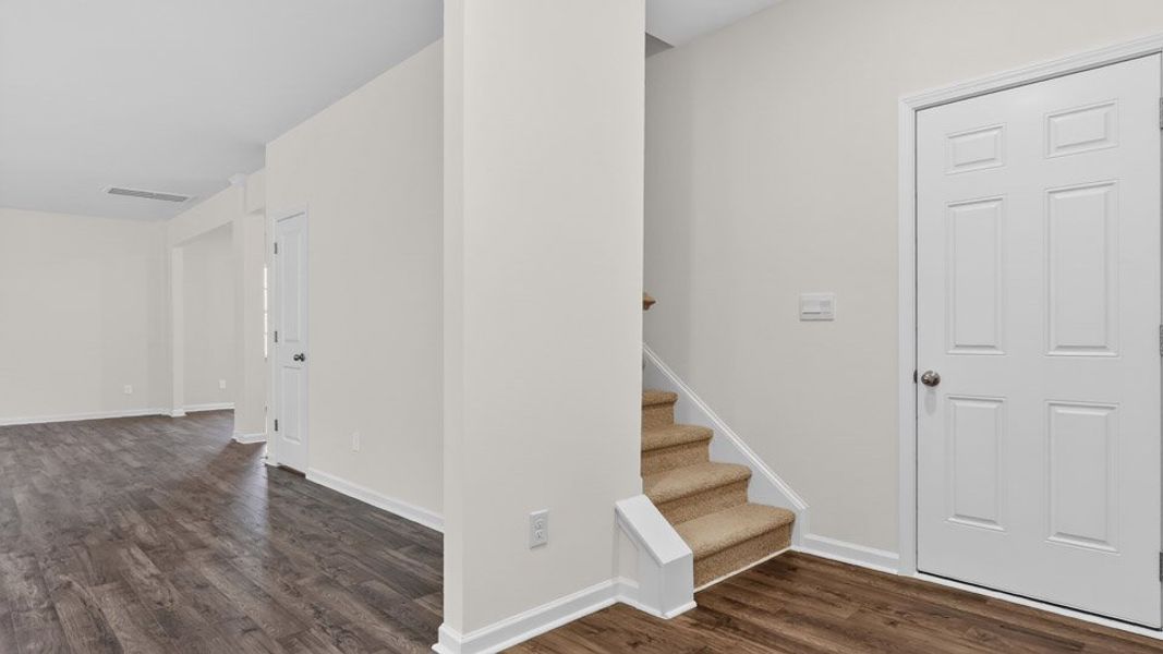 Spacious, unfurnished interior of a new home in Gretchen Pines, West End (Image 22).