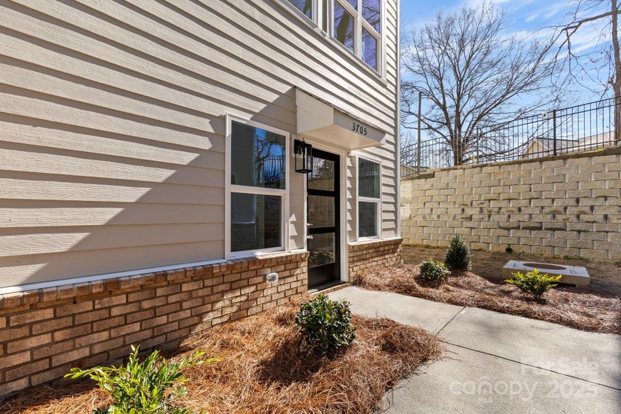 Front exterior of a new home in , Charlotte, NC, highlighting curb appeal (Image 1).