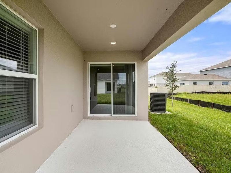 Exterior details and patio area of a home in VillaMar, Winter Haven (Image 2).