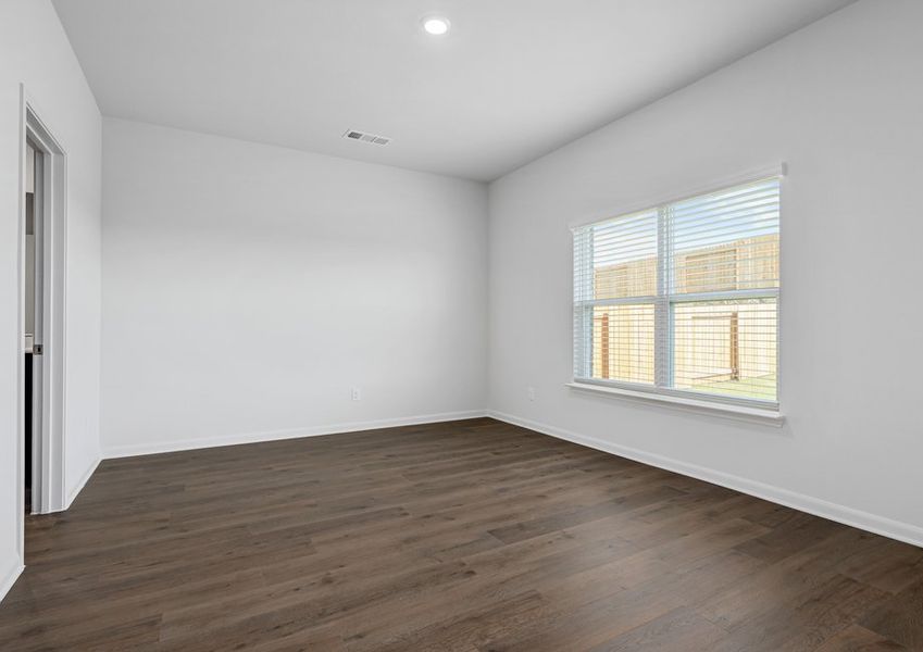 The master bedroom has a large window that lets in great, natural light. The master bedroom has a large window that lets in great, natural light.