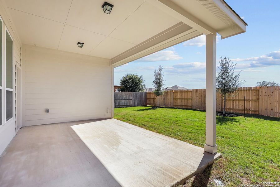 Exterior details and patio area of a home in Stillwater Ranch 45', San Antonio (Image 20). Exterior details and patio area of a home in Stillwater Ranch 45', San Antonio (Image 20).