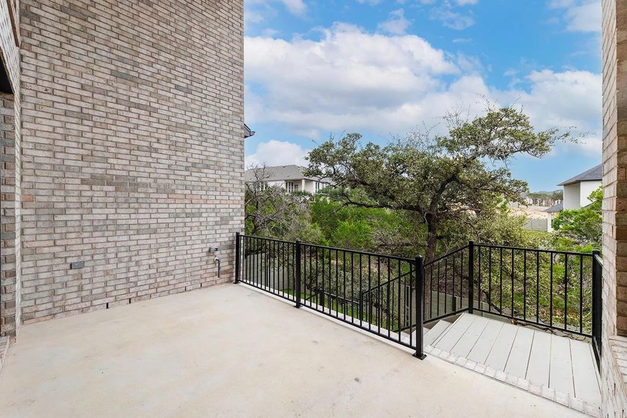 Exterior details and patio area of a home in Wolf Ranch West Bend - 60', Georgetown (Image 3).