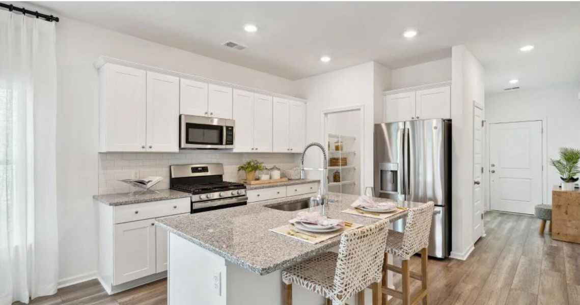 Furnished interior view inside a new home in Heron's Walk at Summers Corner: Carolina Collection, Summerville (Image 5).