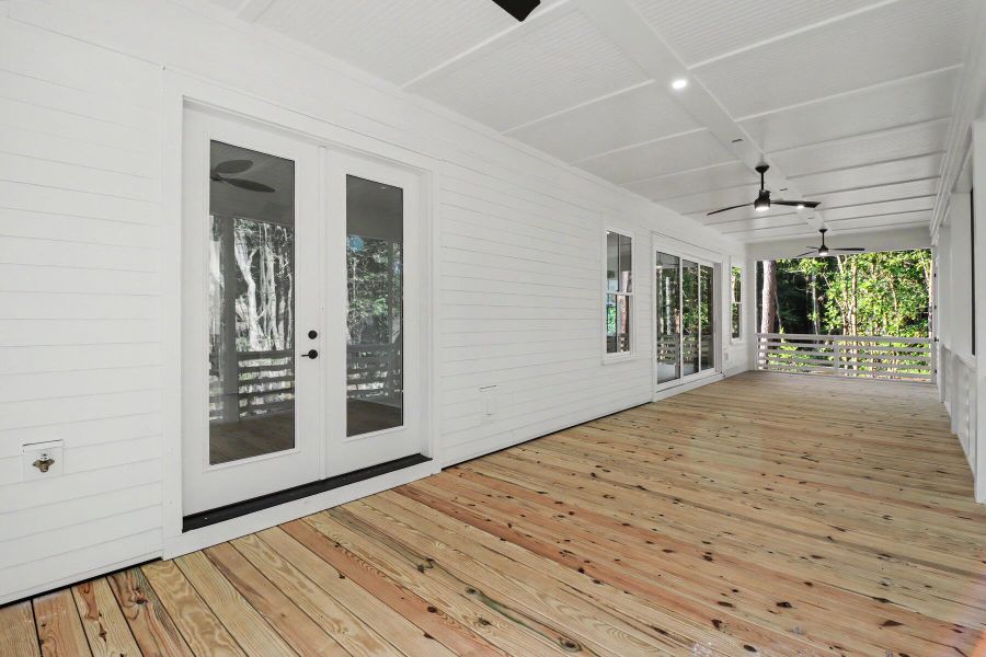 Exterior details and patio area of a home in The Preserve at Pennys Creek, Johns Island (Image 28).