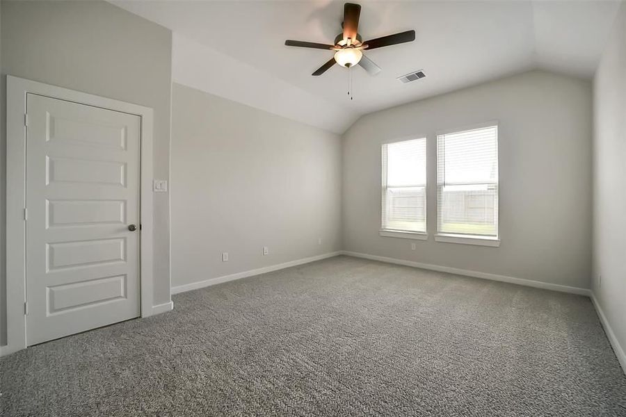 Spacious, unfurnished interior of a new home in Sunterra, Katy (Image 34).
