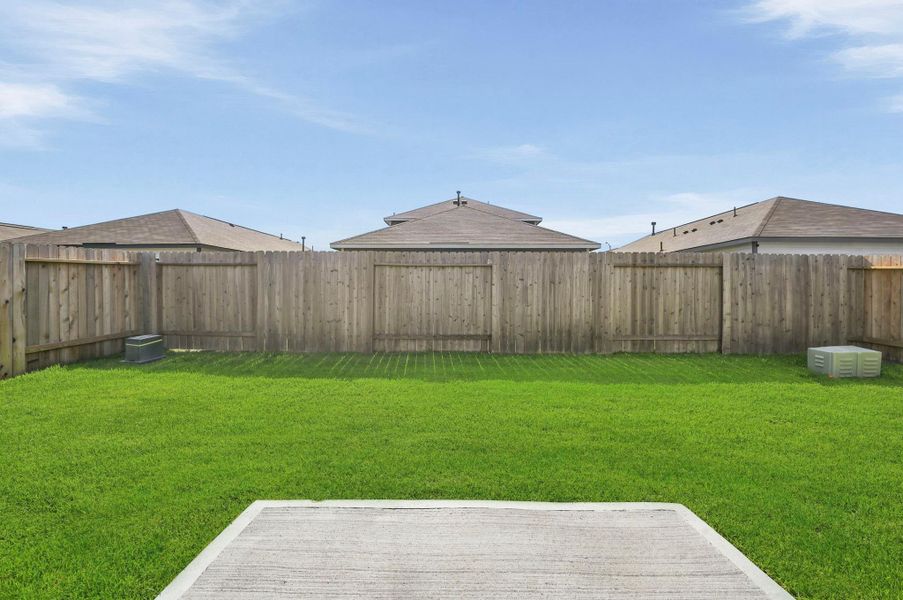 Exterior details and patio area of a home in Barrett Crossing, Crosby (Image 18).