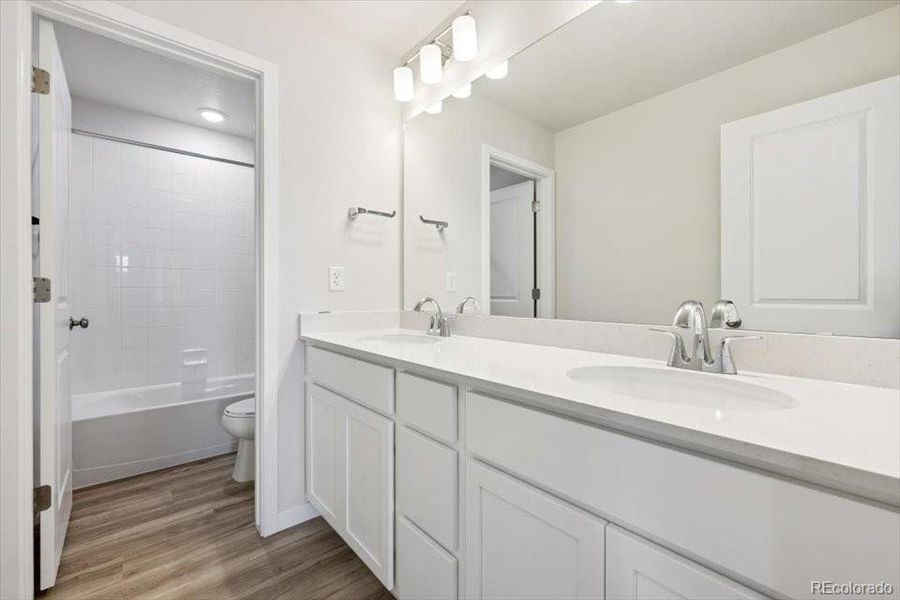 Furnished interior view inside a new home in The Boulevard II Collection at Windler, Aurora (Image 6).