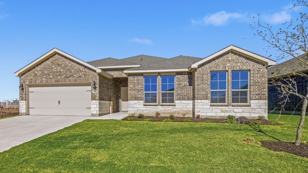 Front exterior of a new home in The Woods at Lindsey Place, Anna, TX, highlighting curb appeal (Image 1).