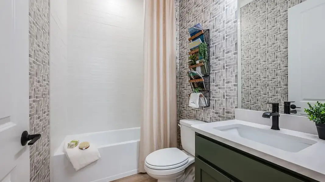 Representative furnished interior of a home built from the Marino by Taylor Morrison in Esplanade at Pinewalk, St. Johns (Image 11).