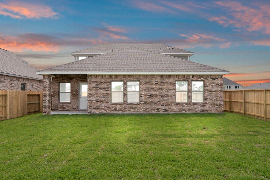 Exterior details and patio area of a home in Windrose Green, Angleton (Image 25). Exterior details and patio area of a home in Windrose Green, Angleton (Image 25).
