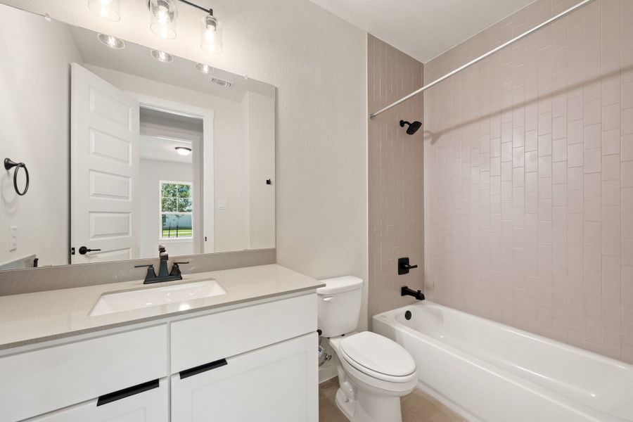 Furnished interior view inside a new home in Wolf Ranch, Georgetown (Image 17).