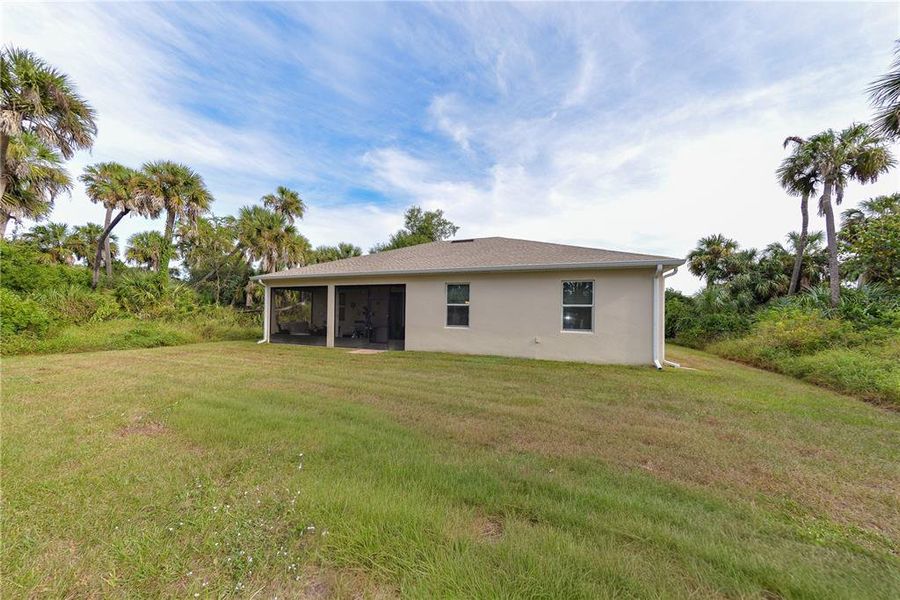 Exterior details and patio area of a home in , North Port (Image 22).