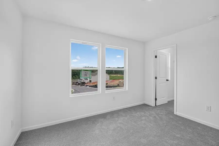Spacious, unfurnished interior of a new home in Weatherfield, Buford (Image 28).