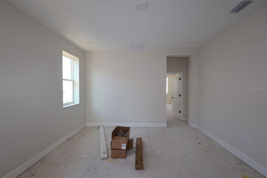 In-progress construction of a new home in Lake Star at Ovation, Winter Garden, FL (Image 11).