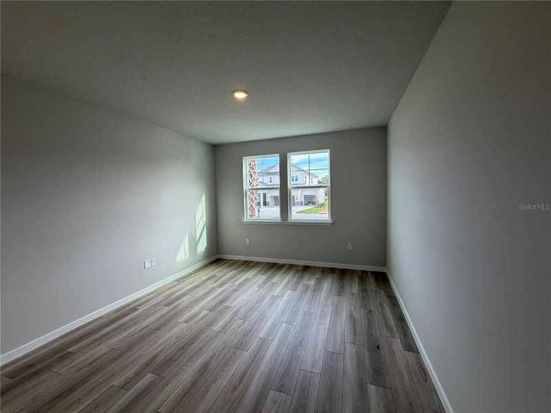 Spacious, unfurnished interior of a new home in The Cypress Series at Reserve East, Flagler Beach (Image 41).