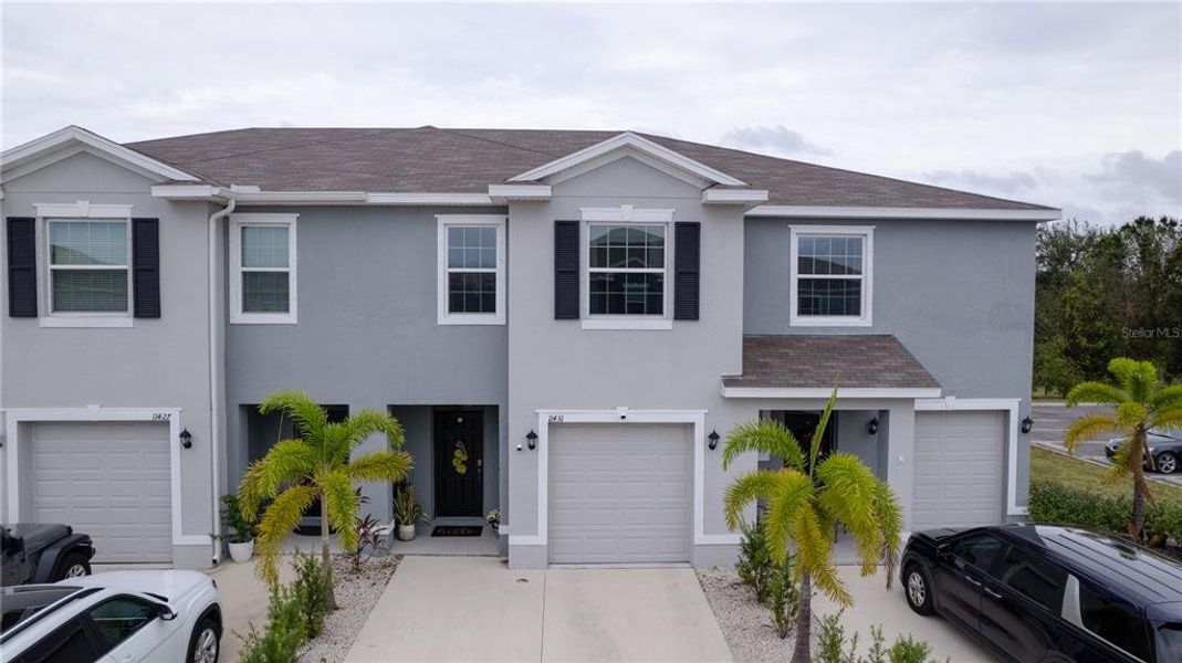 Front exterior of a new home in , Bradenton, FL, highlighting curb appeal (Image 19).
