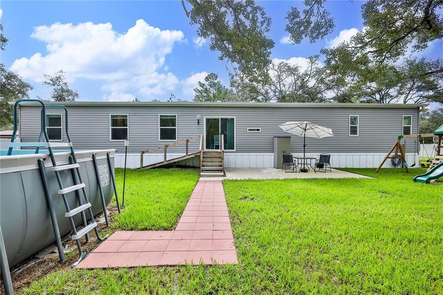 Exterior details and patio area of a home in , Weeki Wachee (Image 25). Exterior details and patio area of a home in , Weeki Wachee (Image 25).