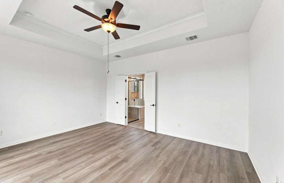Spacious, unfurnished interior of a new home in Bluffview Reserve, Leander (Image 32).