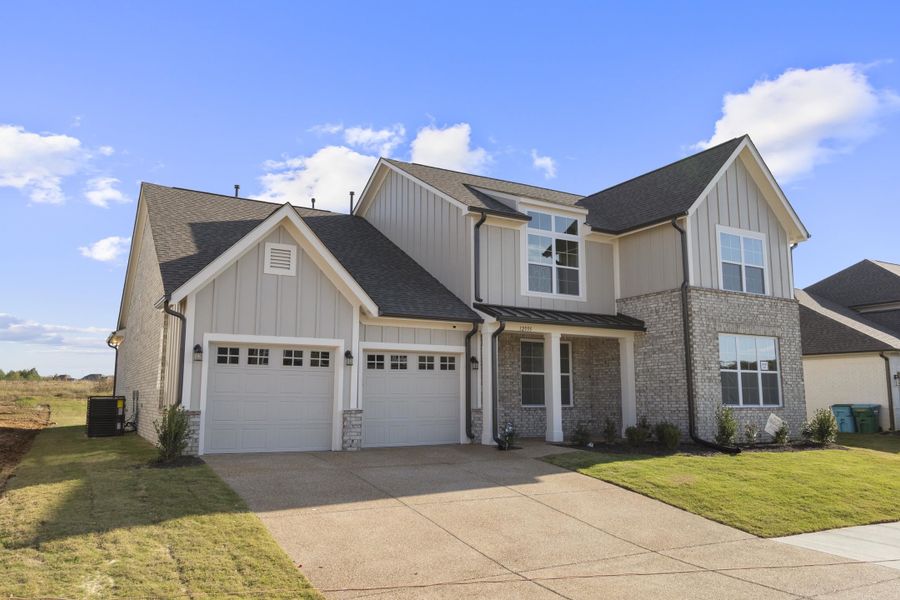 Front exterior of a new home in White Oak, Arlington, TN, highlighting curb appeal (Image 20).