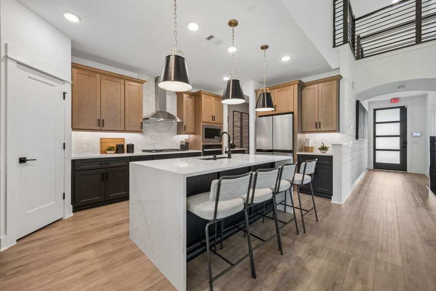 Representative furnished interior of a home built from the Amherst by Pulte Homes in Mavera, Conroe (Image 12).
