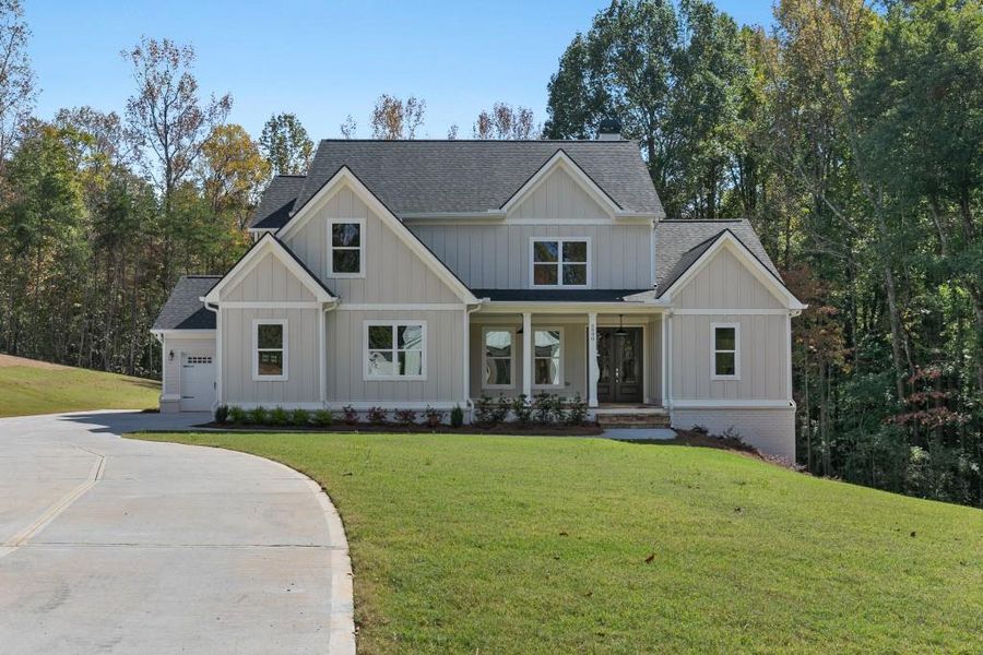 Front exterior of a new home in , Dawsonville, GA, highlighting curb appeal (Image 1).