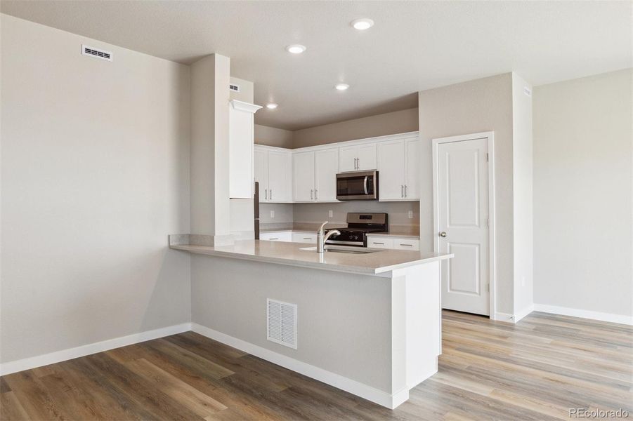 Furnished interior view inside a new home in Bennett Ranch, Bennett (Image 3).