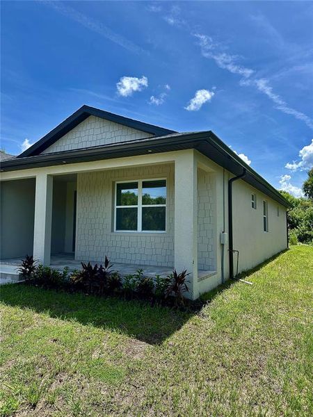 Exterior details and patio area of a home in , Rotonda West (Image 3).