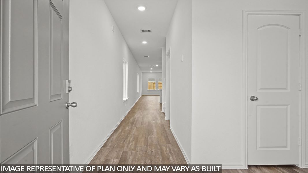 Spacious, unfurnished interior of a new home in Sunterra, Katy (Image 19).