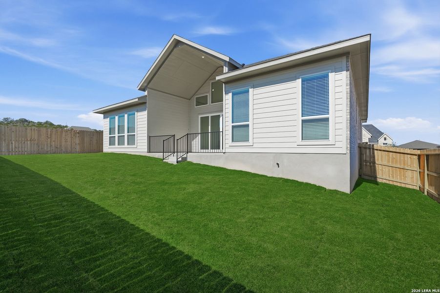Exterior details and patio area of a home in Potranco Oaks, Castroville (Image 4).