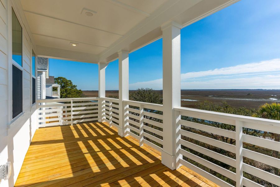 Exterior details and patio area of a home in Overlook at Copahee Sound, Awendaw (Image 36).