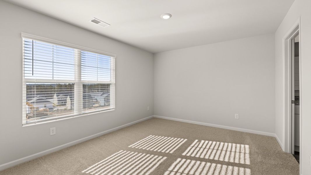 Representative unfurnished interior of a home built from the Mansfield by D.R. Horton in Southwind Village, Evans (Image 29).