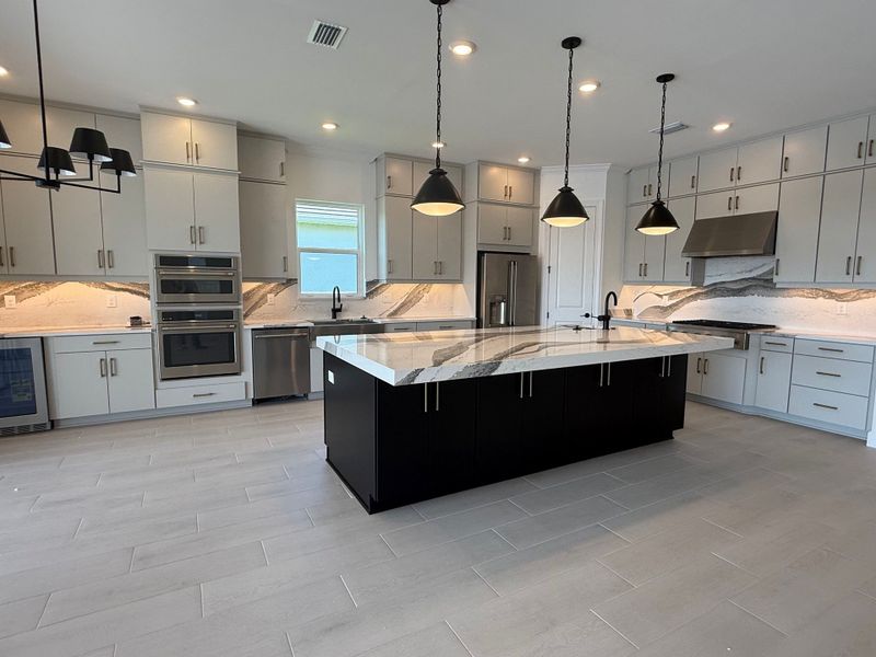 Furnished interior view inside a new home in Esplanade Lake Club, Fort Myers (Image 4).