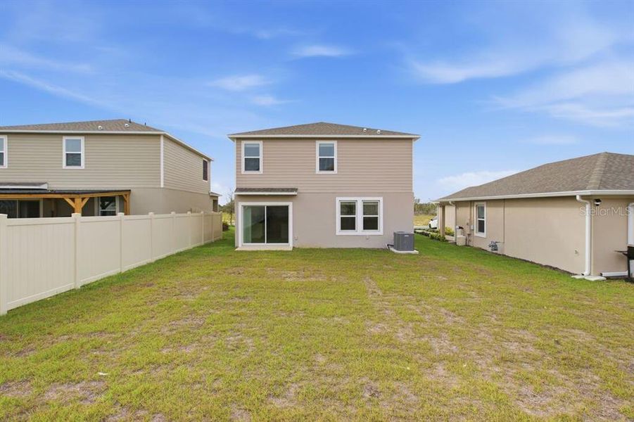 Exterior details and patio area of a home in Waterstone, Groveland (Image 28).