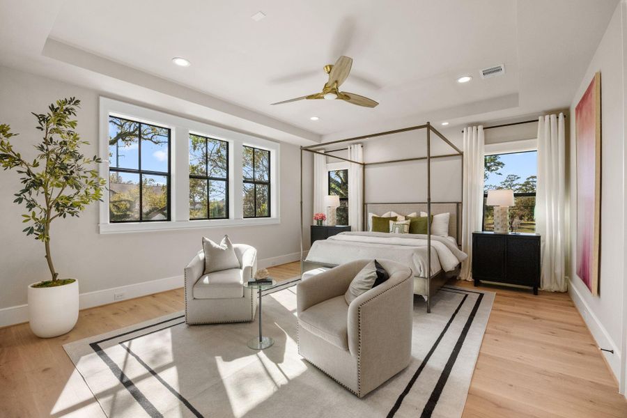 Primary Suite is super spacious w/ plenty of room for King Size bed set & additional seating area. Windows have been moved up for privacy. Trayed ceiling offers balanced recessed lighting and speaker pre-wire for audio options.