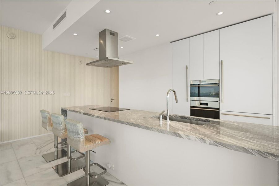 Furnished interior view inside a new home in Missoni Baia, Miami (Image 8).