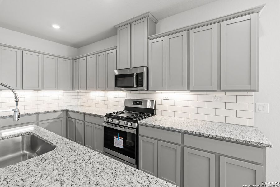 Furnished interior view inside a new home in The Meadows at Hunters Ranch, San Antonio (Image 6).