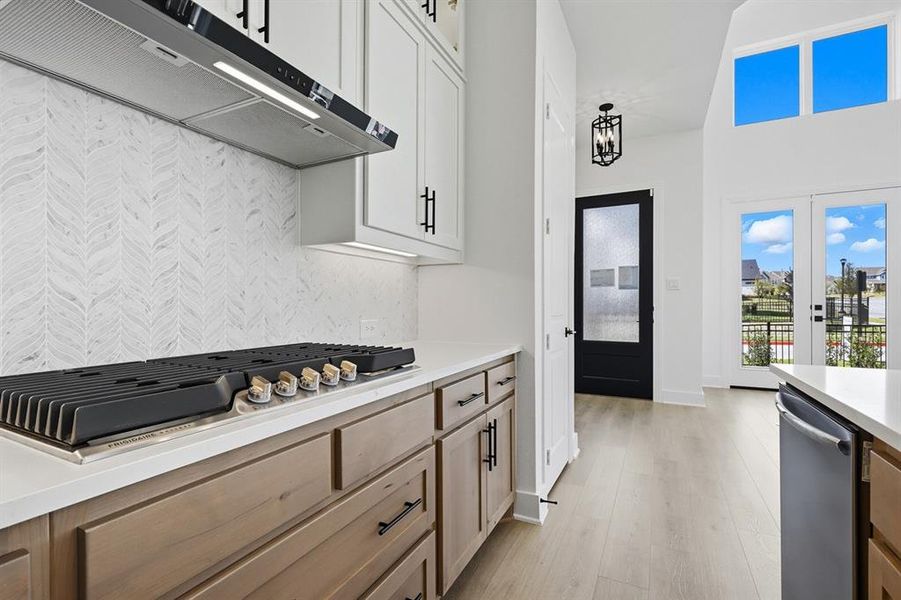 Furnished interior view inside a new home in Walsh: Townhomes - The Patios, Aledo (Image 10). Furnished interior view inside a new home in Walsh: Townhomes - The Patios, Aledo (Image 10).