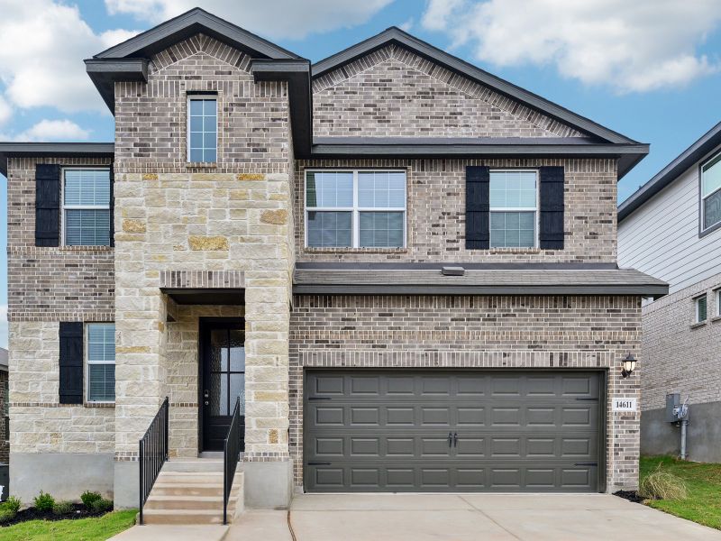 Front exterior of the Red River floorplan at a Meritage Homes community.