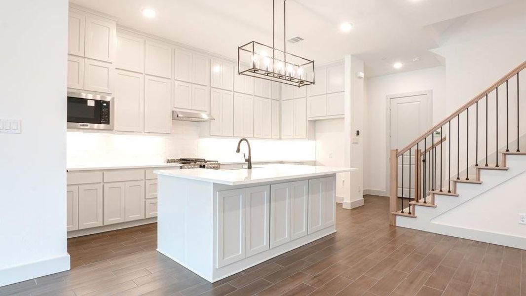 Furnished interior view inside a new home in The Abbey at Mercer Crossing, Farmers Branch (Image 10).